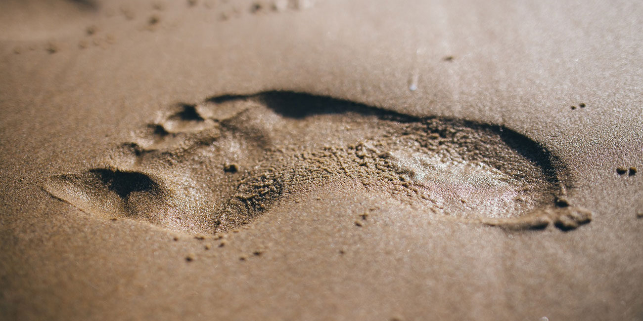 Fußabdruck im Sand